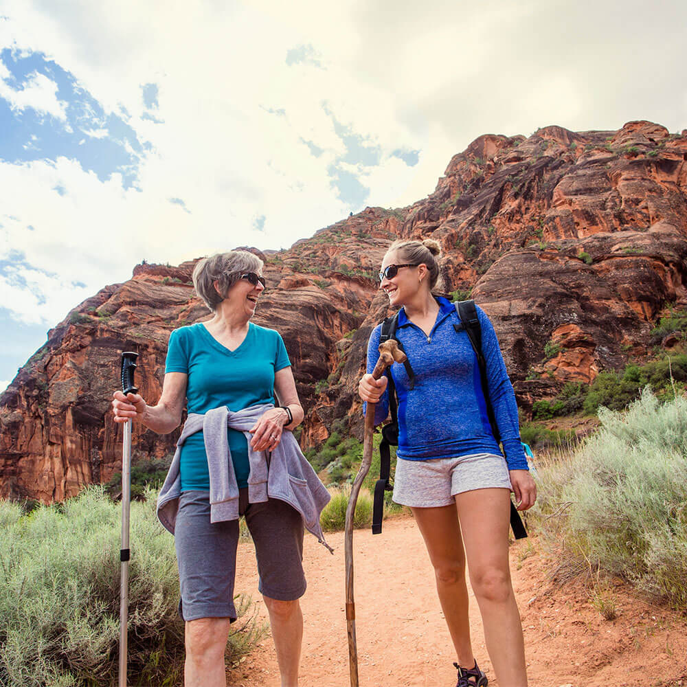 two women hiking mountain